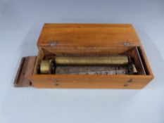 A mid 19thC key wind music box in mahogany case