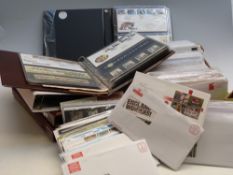 A large quantity of matching GB first day covers and presentation packs,