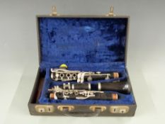 Boosey and Hawkes rosewood clarinet with nickel keys, 312530 stamped to body,