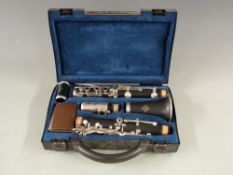 Buffet of Paris B12 cased clarinet in case, composite body, silvered fittings and original receipt,