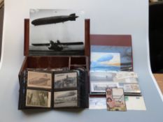 A collection of postcards, stamps,