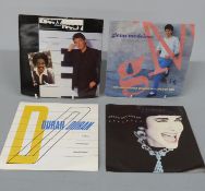 Approximately 260 singles mostly 80s pop