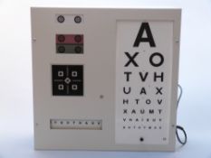 Vintage Evans Instruments Ltd optician's light box with graduated alphabet and other tests,
