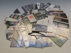 A quantity of loose GB presentation packs