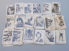 Over 110 black and white The Monkees bubble gum trade cards, each 8.3 x 5.
