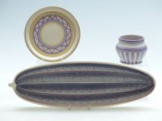 Three pieces of Poole Pottery comprising a vase in purple Portuguese Stripe, 1922-1924, 8cm tall,