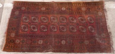 Turkoman Bokhara rug with sixteen octagonal guls surrounded by geometric borders,
