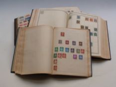 Three large early remainder albums of all-world stamps