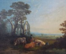 19thC oil on canvas cattle resting by a ruined abbey with landscape beyond,