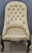 A 19thC button back nursing chair