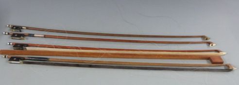 Four anonymous violin bows,