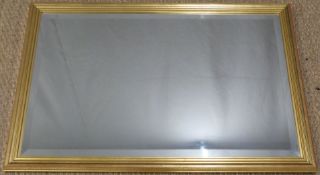 Gilt framed bevelled glass mirror,