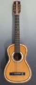 A late 19th / 20thC Spanish guitar by Antonio Carlos Garcia, Madrid and imported by Volgit and Co,