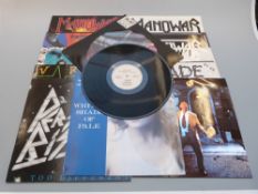 Thirteen 12 inch Rock singles including The Cult (pic disk), Manowar (3), Excalibur, Sacred Reich,