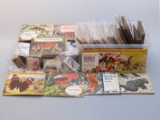 Twenty-four cigarette card albums, full and part sets,
