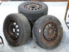 Five steel four stud wheels,