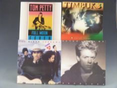 Approximately 70 albums of mixed genres and artists including Tom Petty,