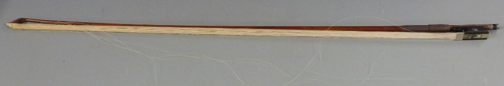 Vuillaume silver mounted round stick violin bow with ebony frog and mother of pearl eye and inlay