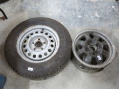 VW alloy wheel marked 6J x 14 H2 together with a steel five stud wheel with 195/70R14 tyre