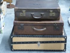 Three vintage suitcases