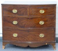 19thC bow fronted flame mahogany chest of two over two drawers,