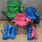 Eight camping or folding chairs