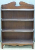 Mahogany waterfall bookcase with shaped pediment