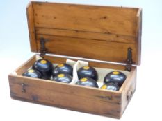 Two sets of E J Riley Ltd lawn bowls