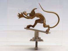 A car mascot in the form of the Devil,