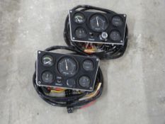 Pair of marine engine instrument panels including tachometer,