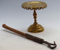 An Arts and Crafts brass pierced trivet / tazza with partial registration number,