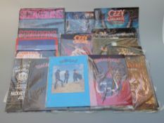 A collection of mainly rock music related photographs, programmes etc including Motorhead, Saxon,