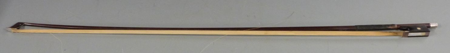 Hill silver mounted round stick violin bow the ebony frog with mother of pearl eyes and inlay,