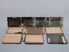 A collection of photographic glass negatives,