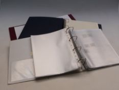 Two boxes of empty stockbooks and albums