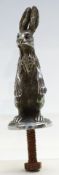 A car mascot in the form of a hare, possibly Alvis,