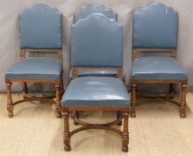 Set of four upholstered chairs with curved moulded stretchers
