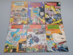 Thirteen DC Detective comics comprising issues 313, 314, 315, 316, 317, 318, 320, 321, 322, 323,