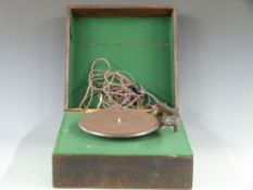 An early Garrard portable record player with Bakelite arm and base