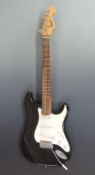Squier Strat by Fender electric rhythm / lead guitar,