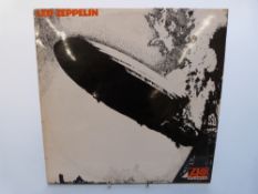 Led Zeppelin - Led Zeppelin (588 171) red/plum label with Superhype credit.