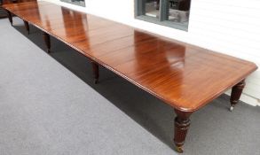 Exceptionally large Maple & Co Ltd mahogany campaign dining or boardroom table,