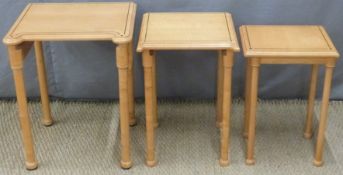 Satinwood nest of three tables with inlaid decoration,