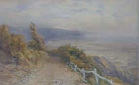 J H Mole watercolour coastal cliff path, signed lower right,