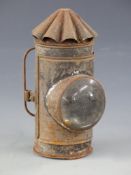 A police or similar hand lamp with fluted top