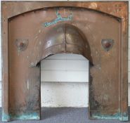 Arts & Crafts / Art Nouveau copper fireplace with riveted decoration and hangers for tools,