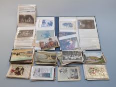 A quantity of early 20thC postcards including local interest Bourton on the Water, Cheltenham,