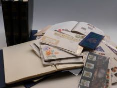 A coin / stamp cover Royal Family collection in six albums celebrating the Golden Wedding