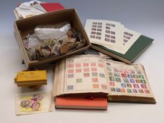 A box of world stamps including Old Empire Album together with an album of WWI silk postcards and