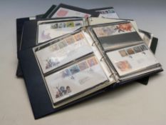 GB Royal Mail Millennium fist day cover collection in three albums and an album of GB regional